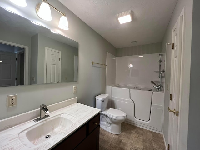 full bathroom with toilet, walk in shower, a bathtub, and vanity
