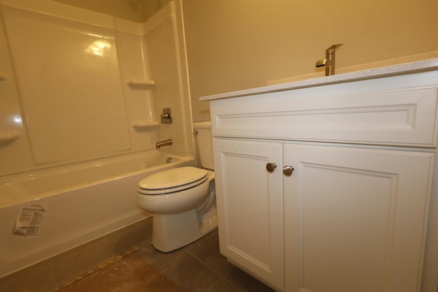 bathroom featuring bathtub / shower combination, vanity, and toilet