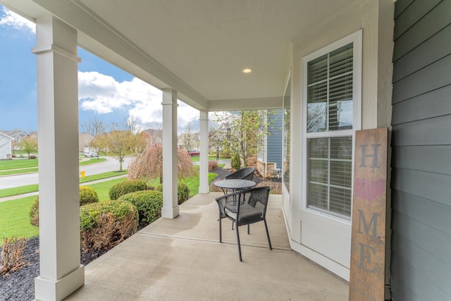 view of patio featuring a porch