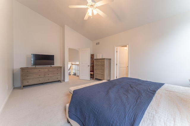 carpeted bedroom with visible vents, ceiling fan, baseboards, and vaulted ceiling