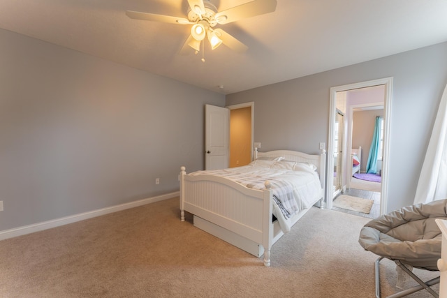 bedroom featuring baseboards, a ceiling fan, and carpet