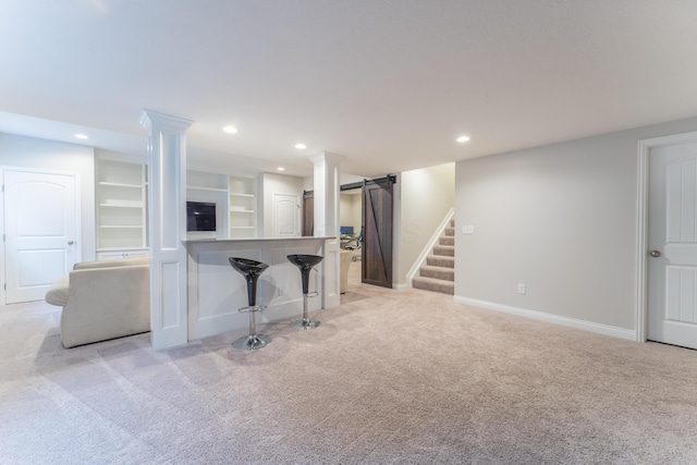 living room with light carpet, recessed lighting, baseboards, and stairs