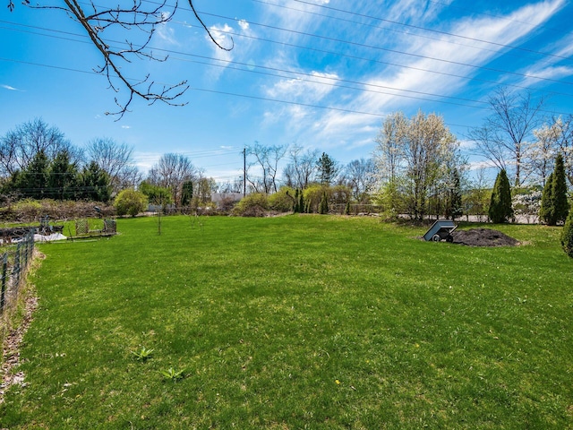 view of yard featuring fence