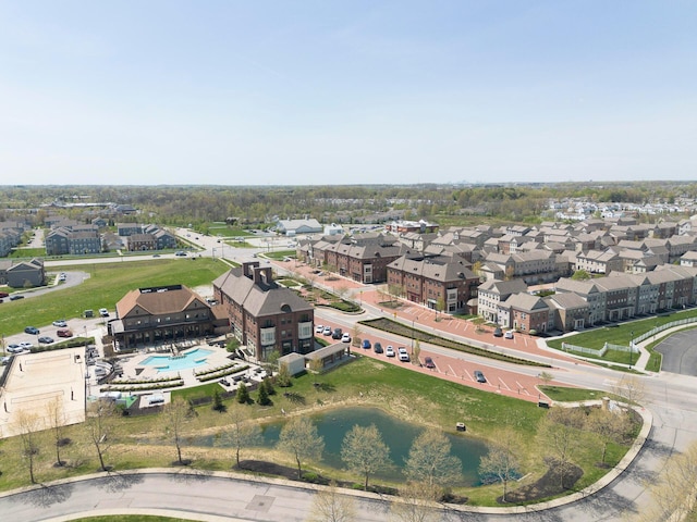 birds eye view of property with a residential view
