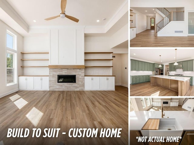 1736 Harvey Ln, Grove City, OH 43123 - unfurnished living room featuring ornamental molding, light wood-style floors, baseboards, a fireplace, and ceiling fan