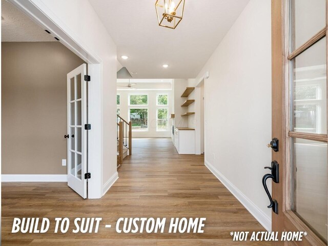 1736 Harvey Ln, Grove City, OH 43123 - entrance foyer featuring recessed lighting, wood finished floors, baseboards, and french doors