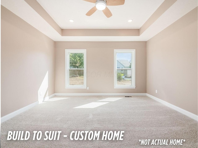 1736 Harvey Ln, Grove City, OH 43123 - unfurnished room featuring ceiling fan, baseboards, visible vents, and a raised ceiling