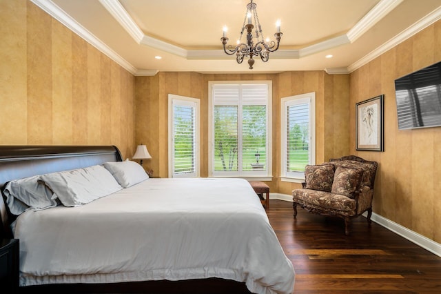 10577 Wellington Blvd, Powell, OH 43065 - bedroom with a tray ceiling, a chandelier, wood finished floors, ornamental molding, and baseboards