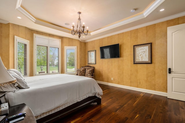10577 Wellington Blvd, Powell, OH 43065 - bedroom featuring a raised ceiling, a chandelier, ornamental molding, dark wood-style floors, and baseboards