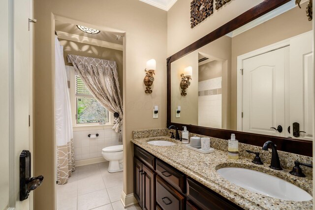 10577 Wellington Blvd, Powell, OH 43065 - bathroom with toilet, tile patterned flooring, double vanity, and ornamental molding