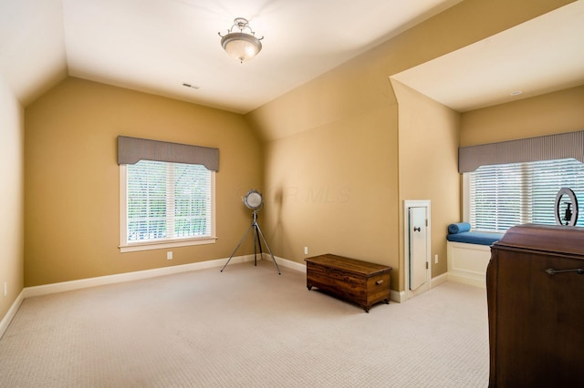 10577 Wellington Blvd, Powell, OH 43065 - sitting room with lofted ceiling, carpet, and baseboards
