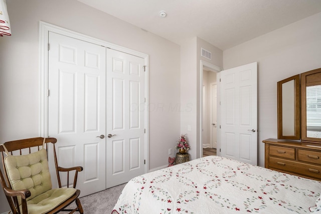 8688 Eliot Dr, Plain City, OH 43064 - bedroom with light carpet, visible vents, and a closet