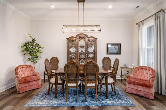 8688 Eliot Dr, Plain City, OH 43064 - dining area with ornamental molding, baseboards, recessed lighting, and wood finished floors