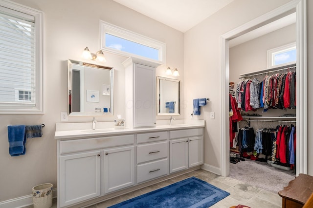 8688 Eliot Dr, Plain City, OH 43064 - full bathroom featuring a spacious closet, double vanity, and a sink