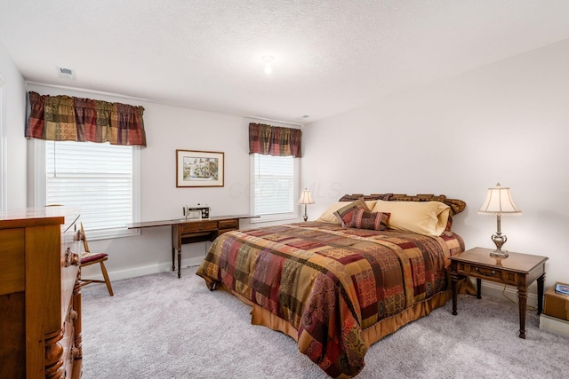 8688 Eliot Dr, Plain City, OH 43064 - bedroom featuring carpet, visible vents, baseboards, and a textured ceiling