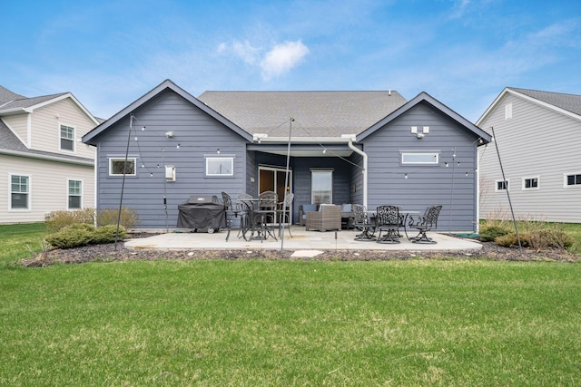 8688 Eliot Dr, Plain City, OH 43064 - back of house with a patio and a lawn