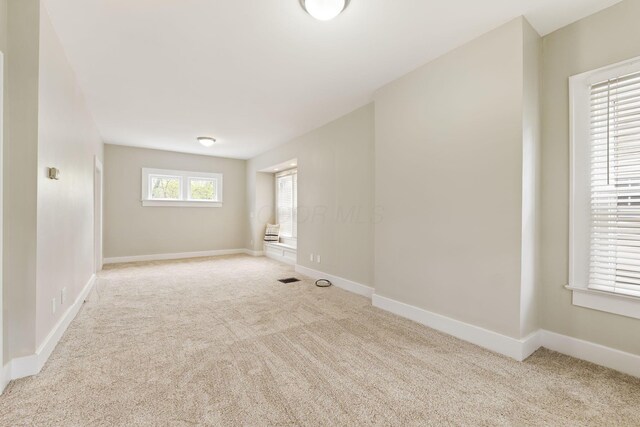 300 N Franklin St, Delaware, OH 43015 - spare room with carpet floors, baseboards, and visible vents