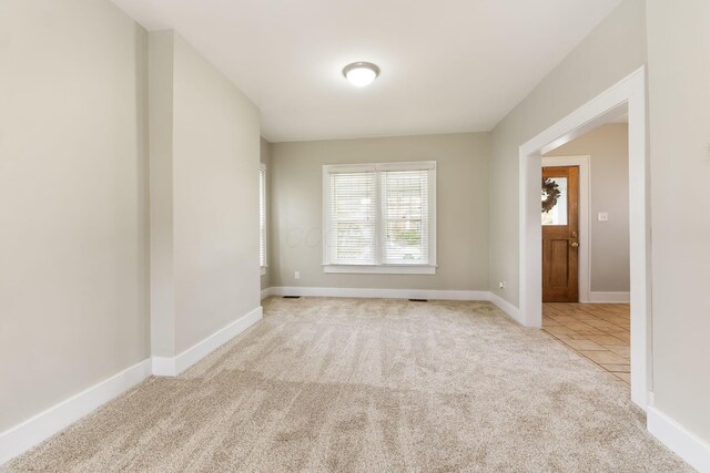 300 N Franklin St, Delaware, OH 43015 - carpeted empty room featuring baseboards