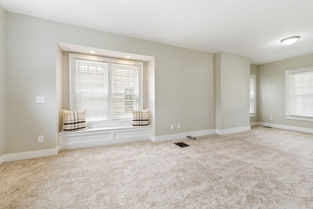300 N Franklin St, Delaware, OH 43015 - empty room with carpet floors, baseboards, and visible vents
