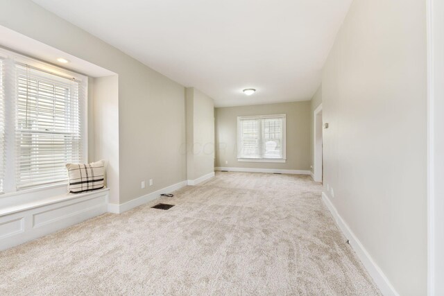 300 N Franklin St, Delaware, OH 43015 - spare room with visible vents, baseboards, and light colored carpet