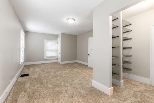 300 N Franklin St, Delaware, OH 43015 - unfurnished bedroom featuring carpet floors, baseboards, and visible vents