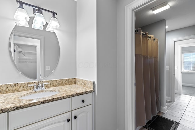 3697 Echo Pl, Powell, OH 43065 - full bath featuring a shower with curtain, tile patterned flooring, and vanity