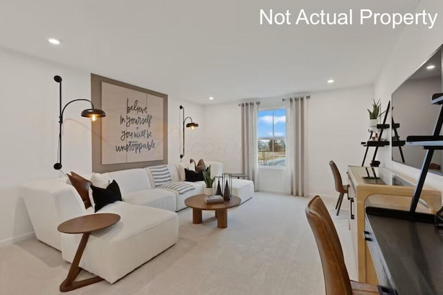 carpeted living area featuring recessed lighting