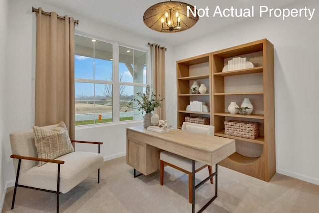 office featuring baseboards and light colored carpet