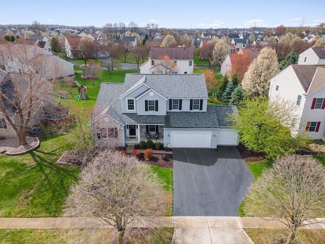 birds eye view of property featuring a residential view