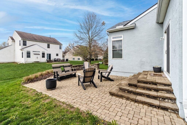 view of patio featuring an outdoor fire pit