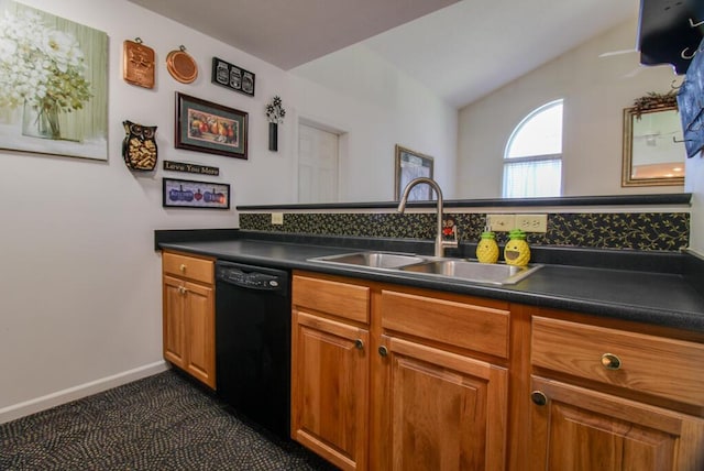2266 Feather Ln, Marion, OH 43302 - kitchen featuring black dishwasher, a sink, dark countertops, brown cabinetry, and vaulted ceiling