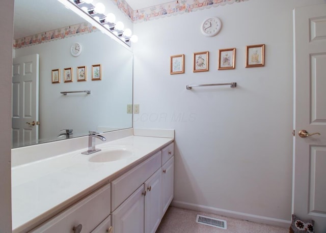 2266 Feather Ln, Marion, OH 43302 - bathroom featuring vanity, visible vents, and baseboards