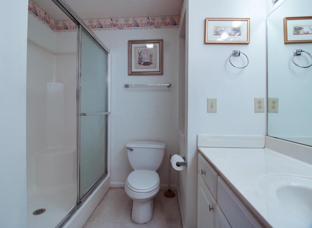 2266 Feather Ln, Marion, OH 43302 - bathroom featuring toilet, a stall shower, and vanity