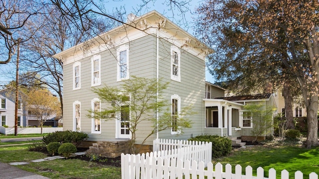 134 N Pearl St, Granville, OH 43023 - italianate-style house featuring a front lawn and fence