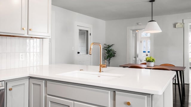 134 N Pearl St, Granville, OH 43023 - kitchen with a sink, decorative light fixtures, and light countertops