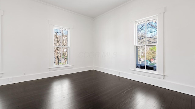 134 N Pearl St, Granville, OH 43023 - spare room featuring dark wood-type flooring, crown molding, and baseboards