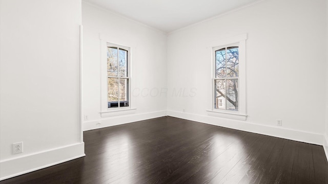 134 N Pearl St, Granville, OH 43023 - empty room with crown molding, baseboards, and dark wood-type flooring