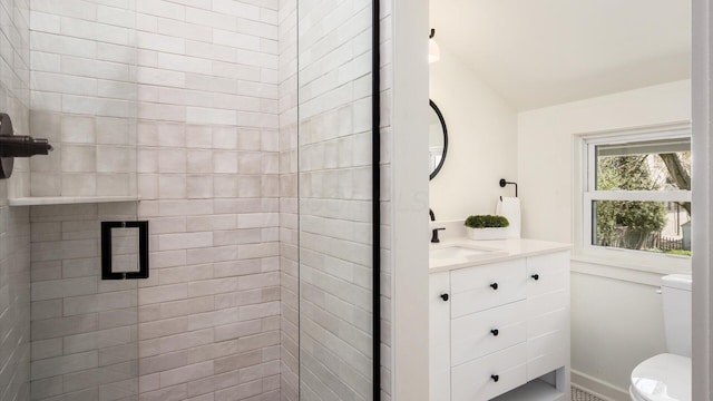 134 N Pearl St, Granville, OH 43023 - full bathroom featuring toilet, a shower stall, vanity, and baseboards