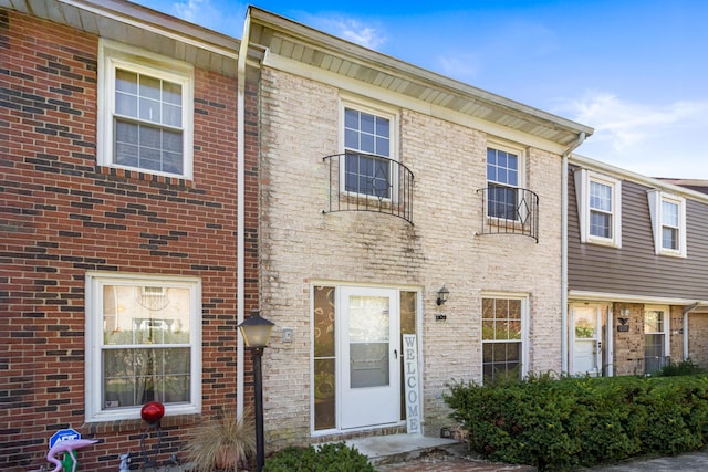 multi unit property featuring brick siding