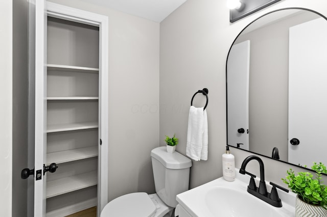 bathroom with a sink and toilet