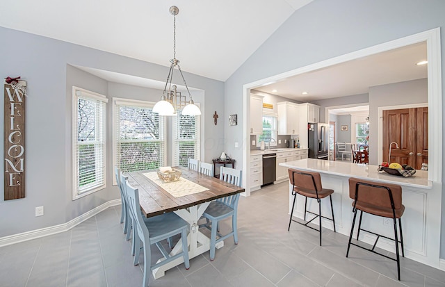 dining room featuring light tile patterned floors, baseboards, recessed lighting, and lofted ceiling