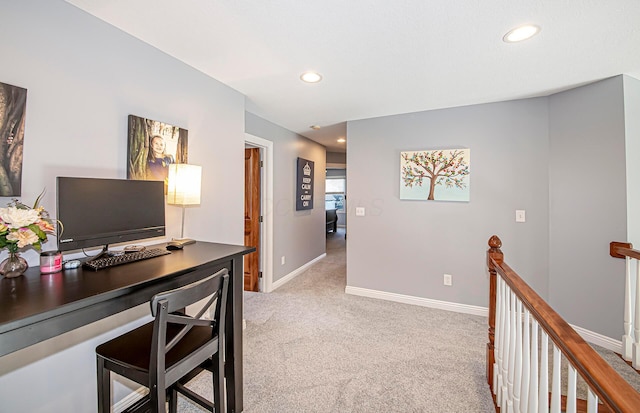 office area featuring light colored carpet, baseboards, and recessed lighting
