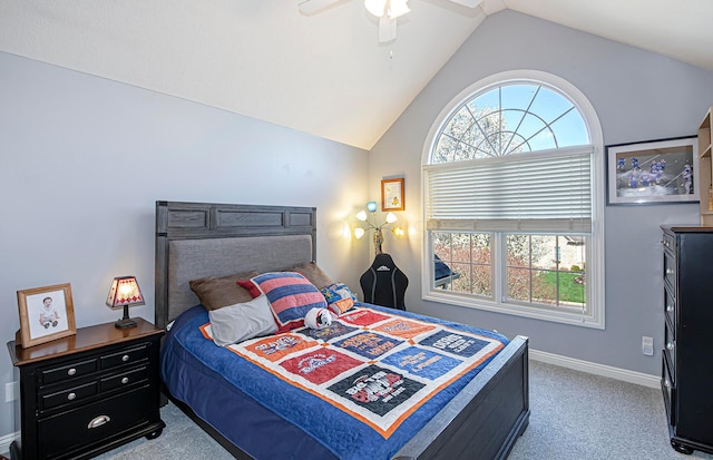 carpeted bedroom featuring baseboards, ceiling fan, and vaulted ceiling