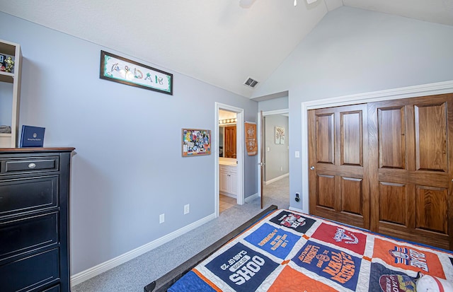 bedroom featuring baseboards, connected bathroom, visible vents, and carpet floors