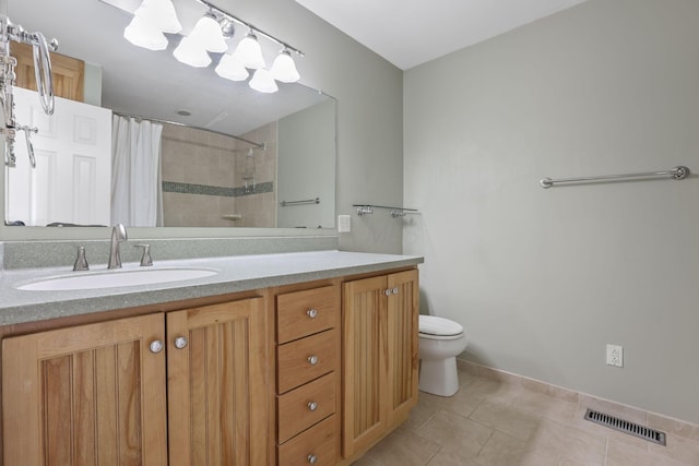 3528 Vintage Woods Dr, Hilliard, OH 43026 - bathroom with vanity, tile patterned flooring, toilet, tiled shower, and visible vents