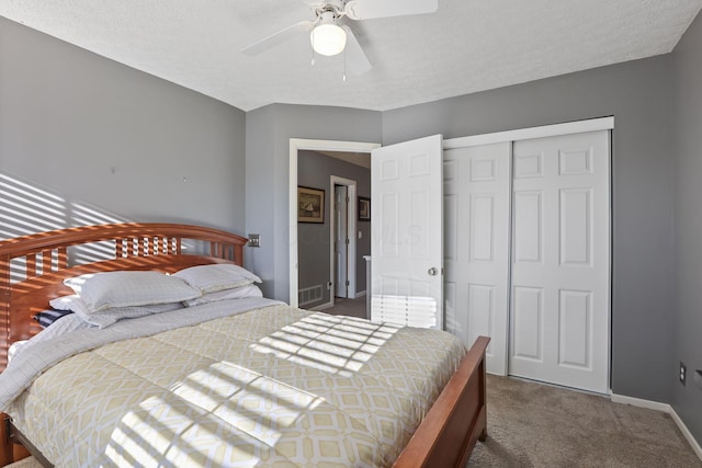 3528 Vintage Woods Dr, Hilliard, OH 43026 - bedroom with ceiling fan, a textured ceiling, a closet, carpet floors, and baseboards
