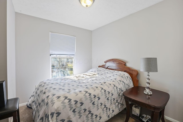 3528 Vintage Woods Dr, Hilliard, OH 43026 - carpeted bedroom featuring a textured ceiling and baseboards