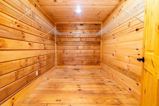 view of sauna with wood finished floors