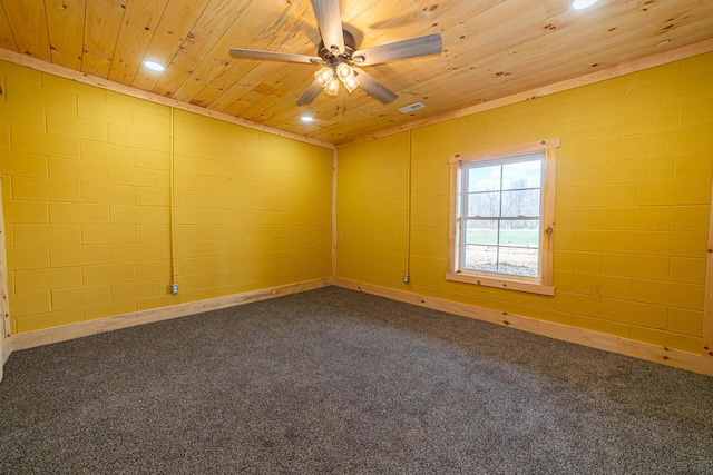 empty room with wooden ceiling, dark colored carpet, a ceiling fan, and recessed lighting