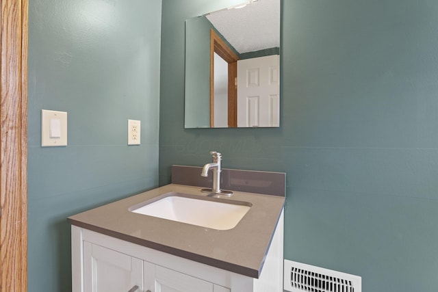 1581 Ringfield Dr, Galloway, OH 43119 - bathroom featuring vanity, visible vents, and a textured ceiling